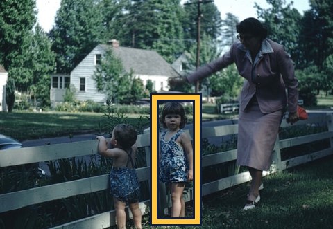 Faded color slide of a toddler at a fence, outlined in gold.